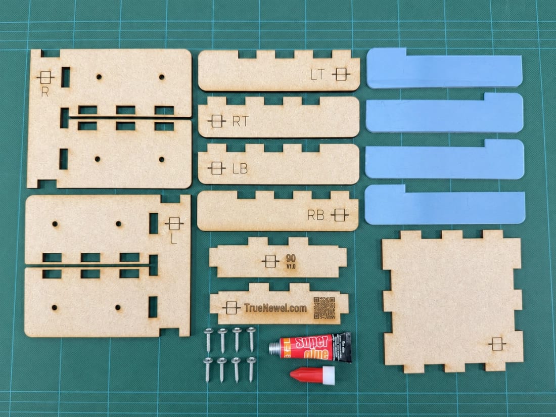 Flat-pack TrueNewel 90 newel post cutting jig parts laid out